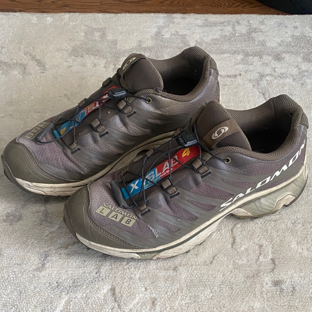 Salomon Brown Gray Trail Running Shoes with Blue Red Accents
